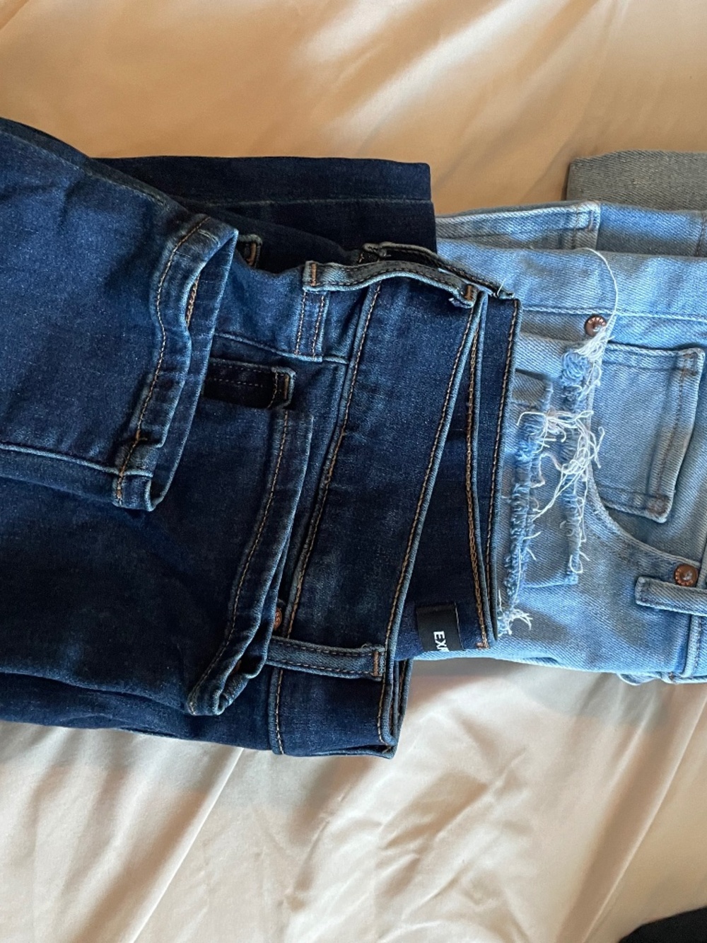 group of 3 pair express 4R jeans